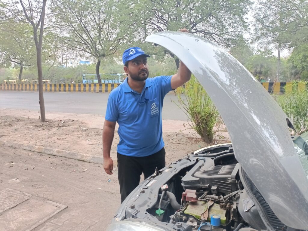 Inspection engineer checking car engine