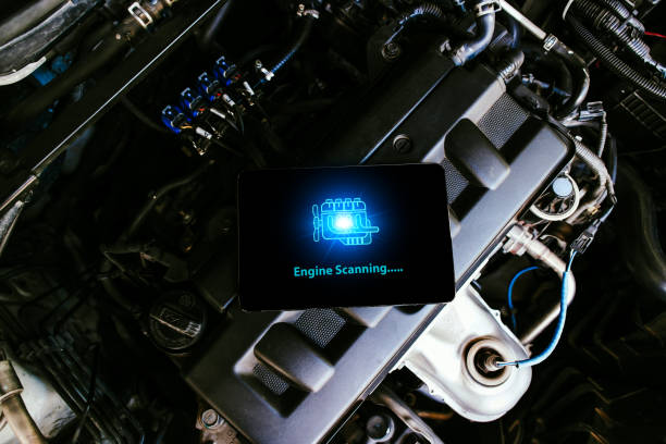 Smartphone with engine diagnostics on the screen, car repair in auto repair shop, Car maintenance service concept.